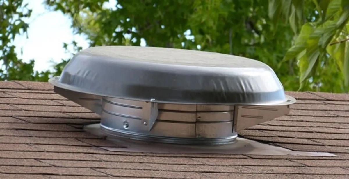 attic fan installation services with low-profile roof ventilation unit in Scottsdale, AZ
