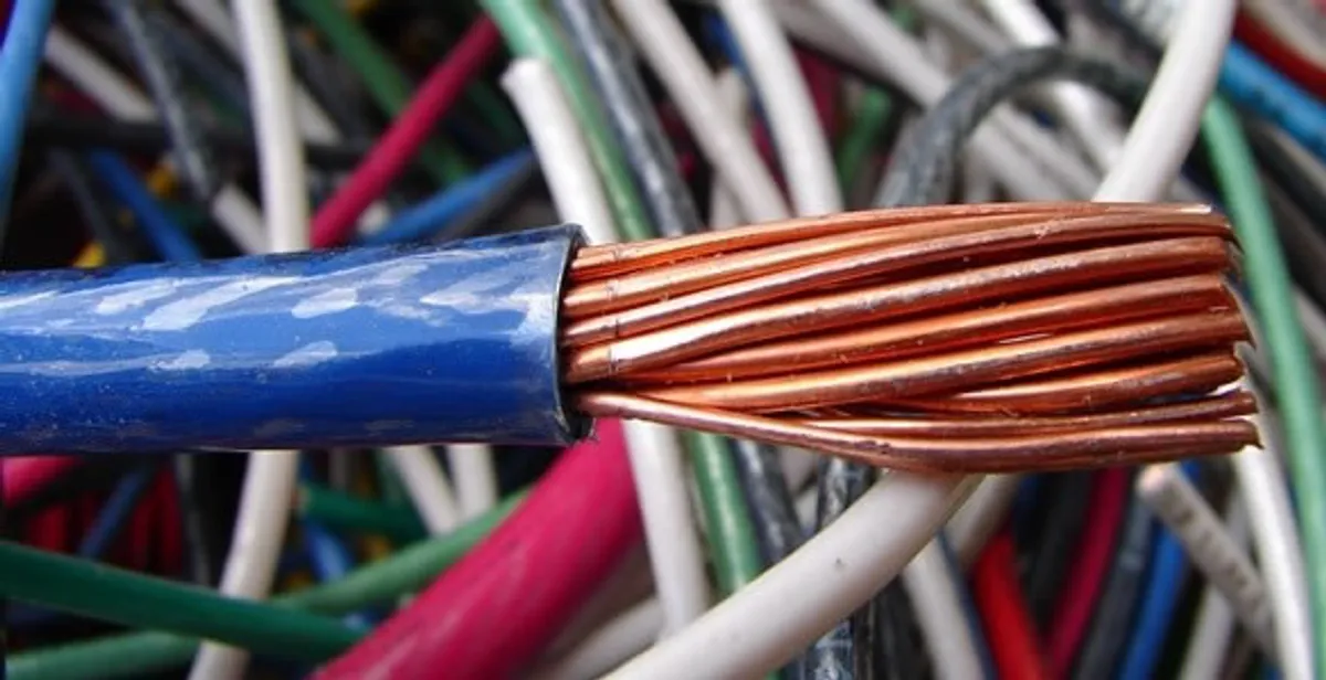 electrical wiring services showing exposed copper conductors and cable preparation in Scottsdale, AZ