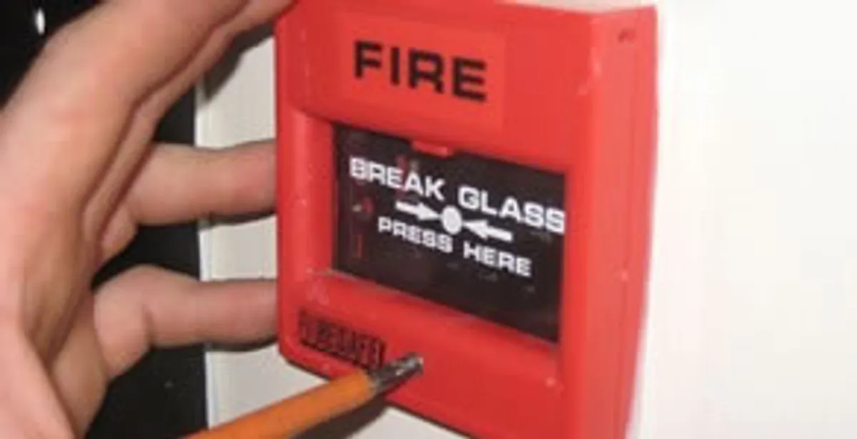 fire alarm installation service showing manual fire alarm pull station installed by licensed electricians in Scottsdale, AZ