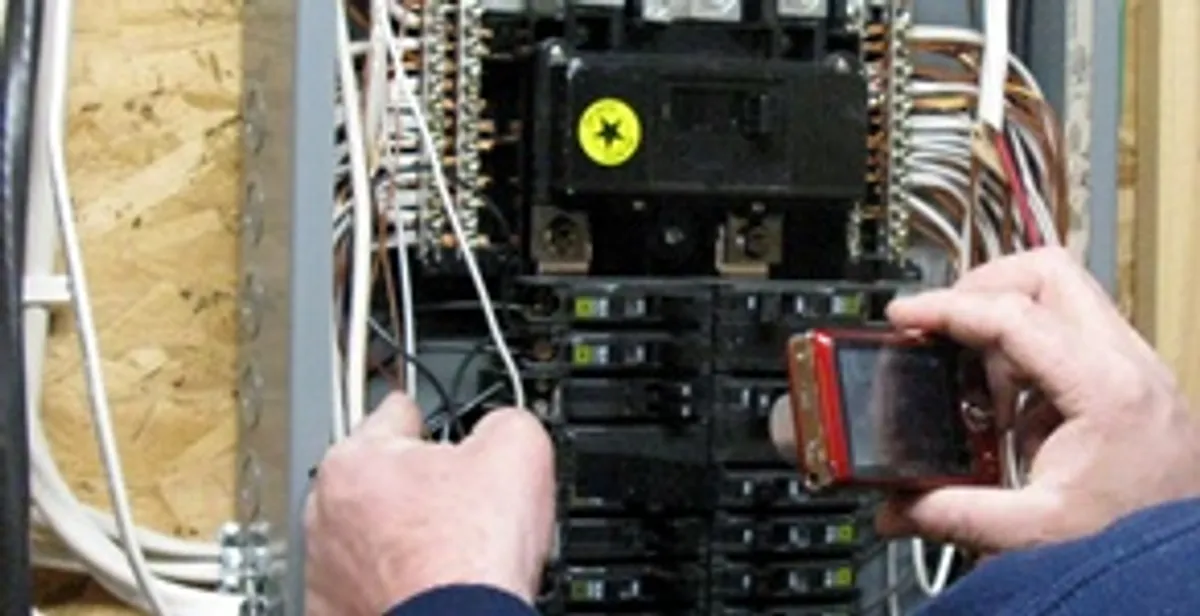 Home electrical inspection of circuit breaker panel by licensed electrician in Scottsdale, AZ