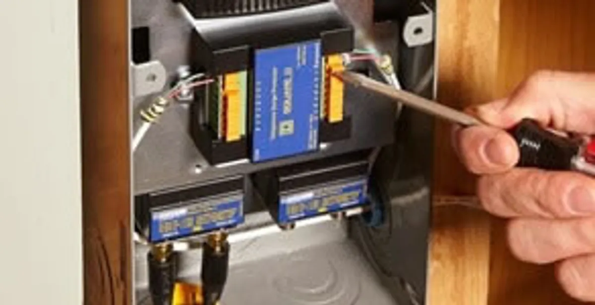 Whole home surge protection device being installed by a licensed electrician to protect electrical systems in Scottsdale, AZ